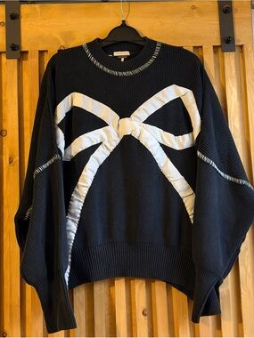 Tricia Fix Free People Black Crewneck Sweater with White Bow Appliqué
